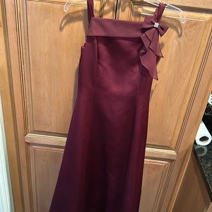 David’s Bridal Gown. In excellent condition.  Worn once. No tears or stains.